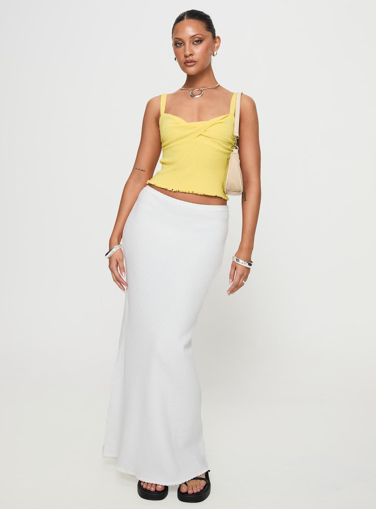 front view of model wearing Princess Polly Dalma Twist Top Yellow Sleeveless Sweetheart 