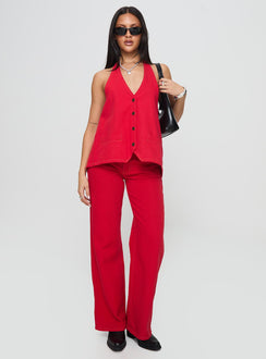 front view of model wearing Princess Polly Top Model Jeans Red Mid Rise Jeans Jeans 