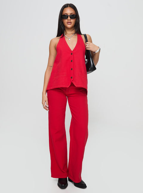 front view of model wearing Princess Polly Top Model Jeans Red Mid Rise Jeans Jeans 