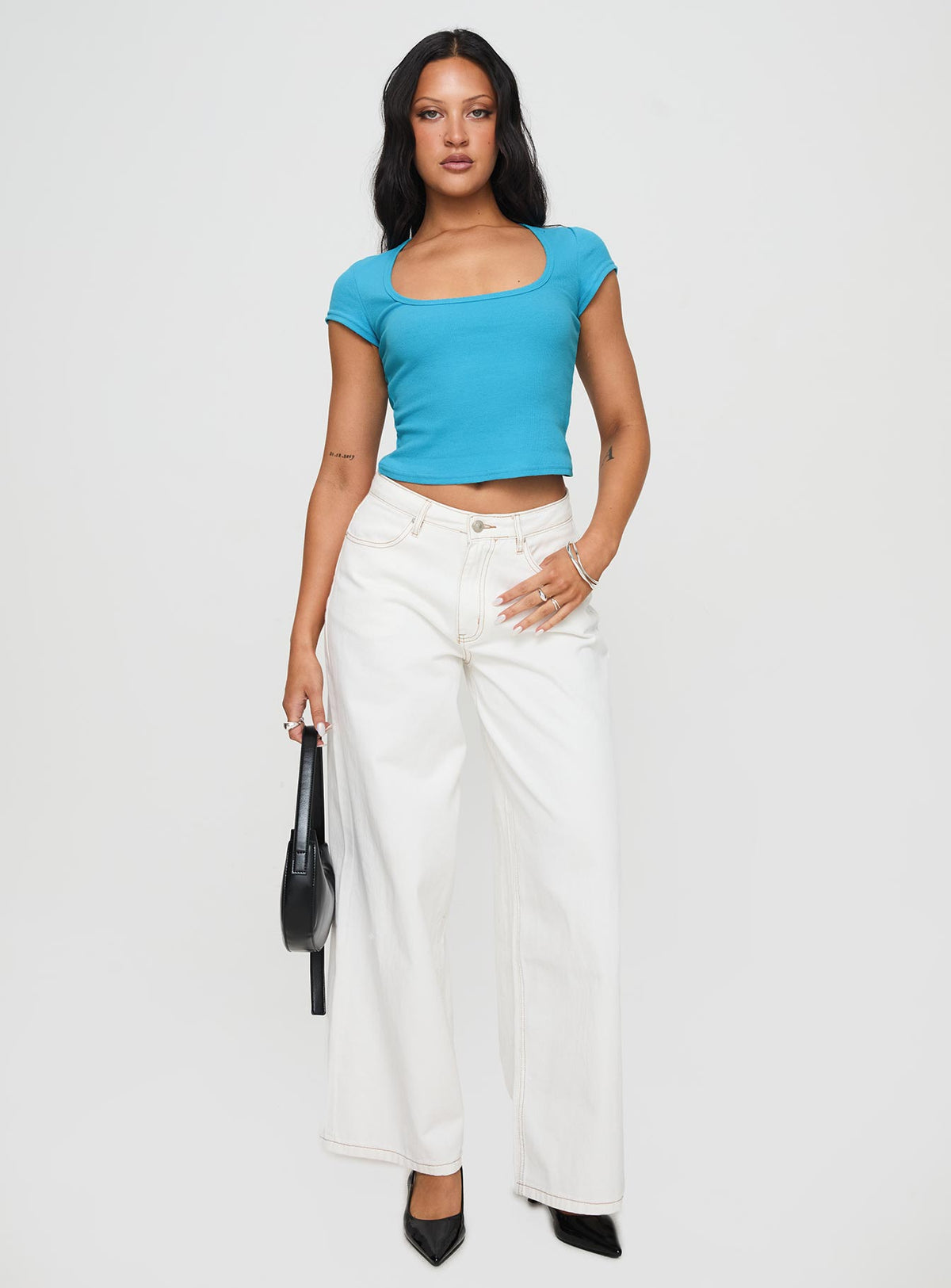 front view of model wearing Princess Polly Baseline Square Neck Rib Top Blue Short Sleeves Square Neck 