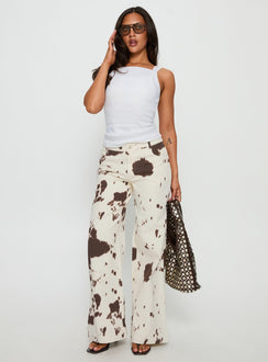 front view of model wearing Princess Polly Big Dreamer Low Rise Straight Leg Jeans Cow Print Low Rise Jeans Jeans 