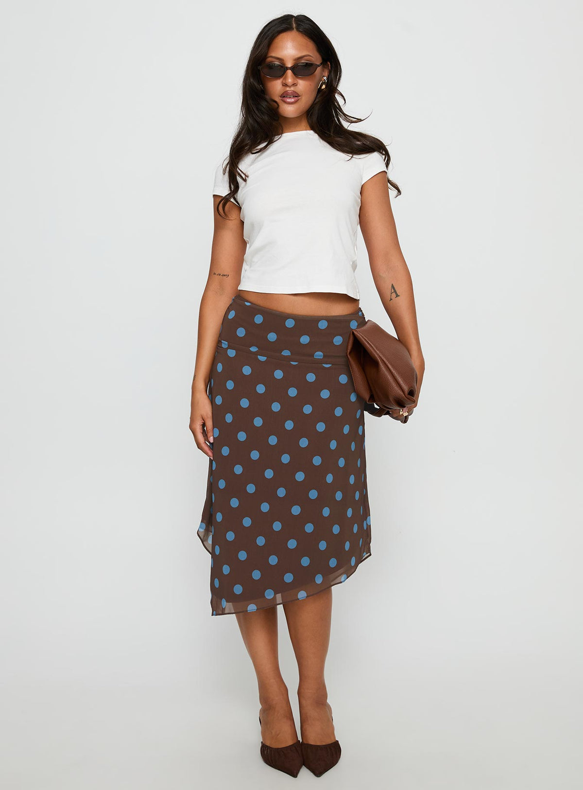   front view of model wearing Princess Polly Daphene Asymmetrical Midi Skirt Brown / Blue Polka Dot Midi Skirts Skirts 