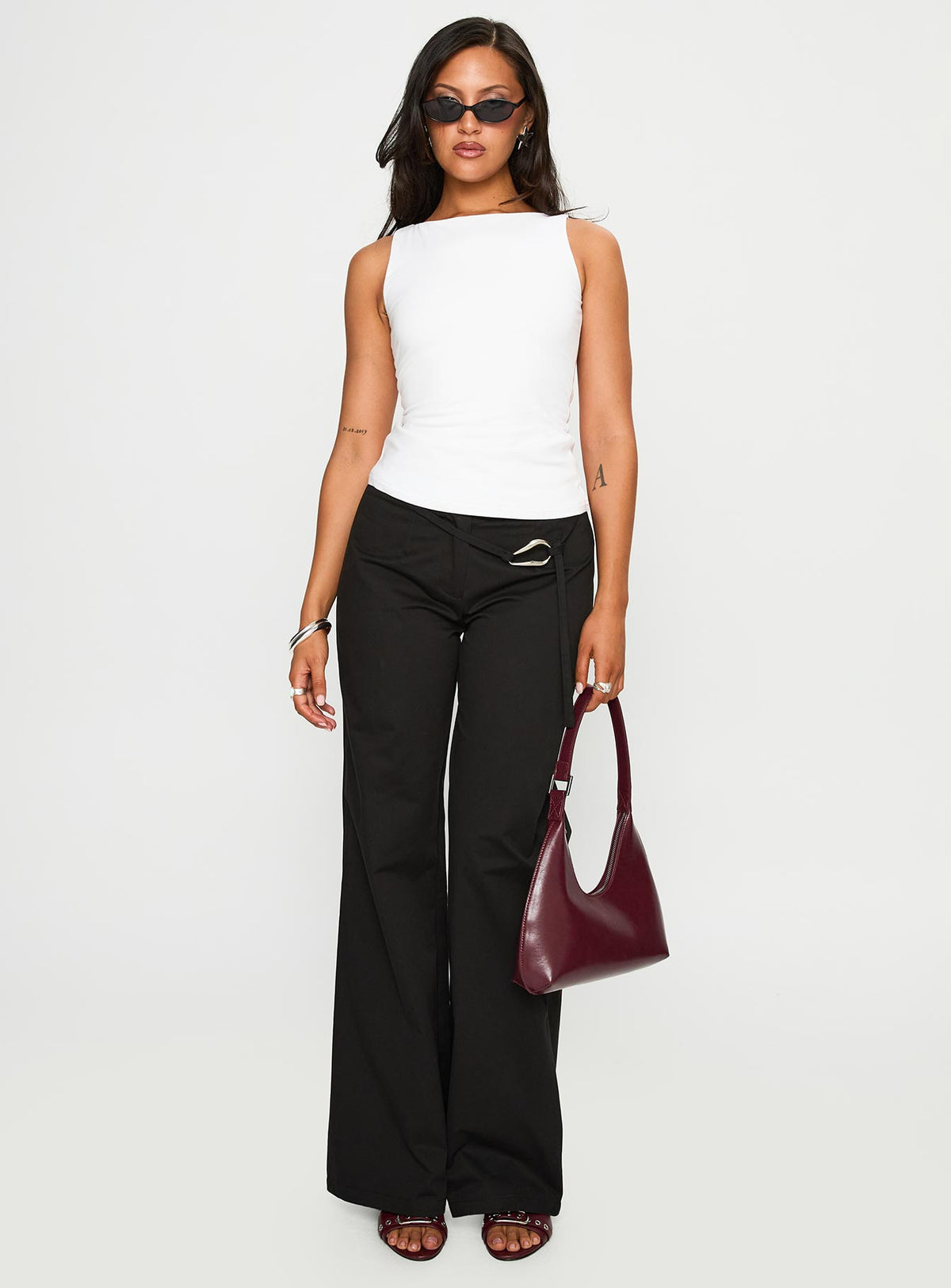 side view of model wearing Princess Polly Lose Your Number High Neck Top White Sleeveless Crew Neck 