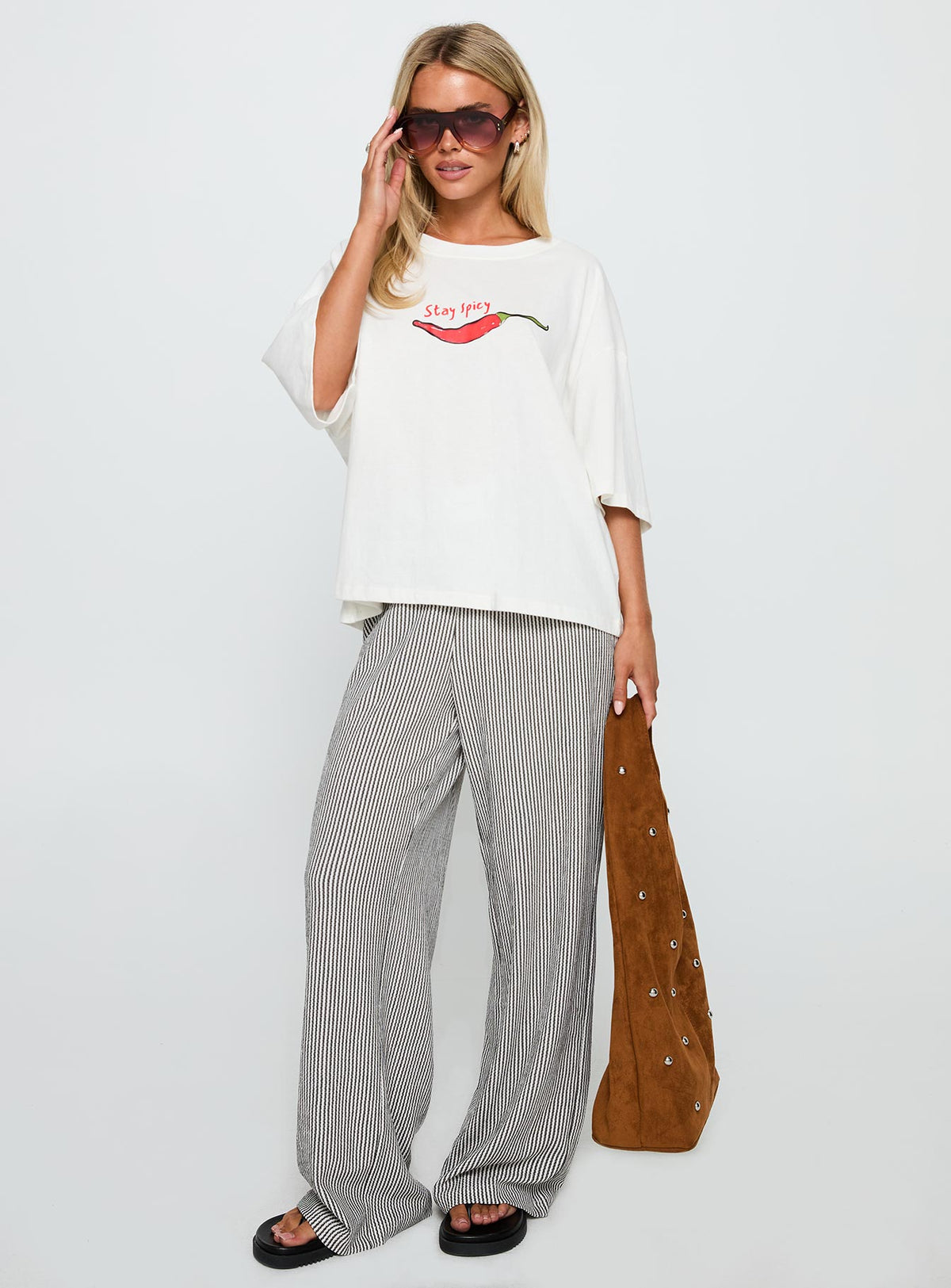 front view of model wearing Princess Polly Stay Spicy Graphic Top White Half Sleeves Crew Neck 