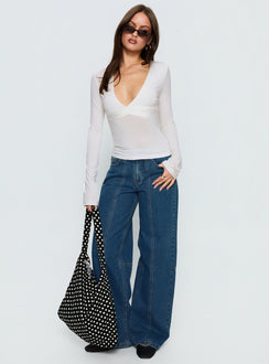 front view of model wearing Princess Polly Lando Low Rise Straight Leg Jeans Mid Blue Wash Mid Rise Jeans Jeans 