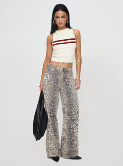 front view of model wearing Princess Polly Top Model Low Rise Straight Leg Jeans Leopard Fade Mid Rise Jeans Jeans 