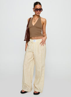 front view of model wearing Princess Polly Beach House Pants Yellow Stripe High Rise Pants Pants 