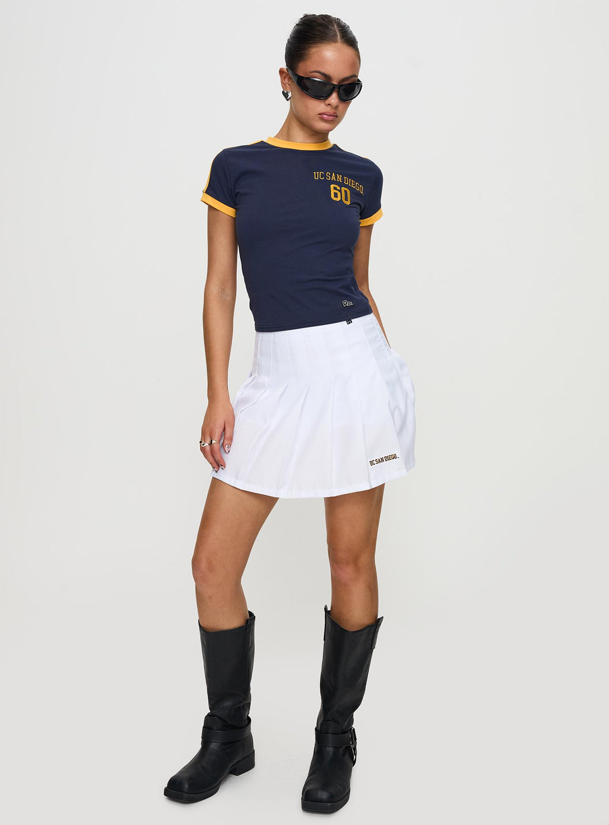   front view of model wearing Princess Polly UCSD Tennis Skort White Skirts 