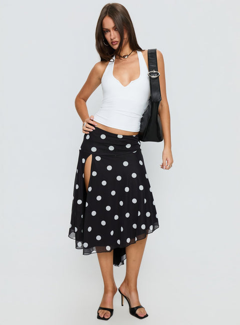   side view of model wearing Princess Polly Dulciana High Split Asymmetrical Midi Skirt Black / Polka Dot Midi Skirts Skirts 