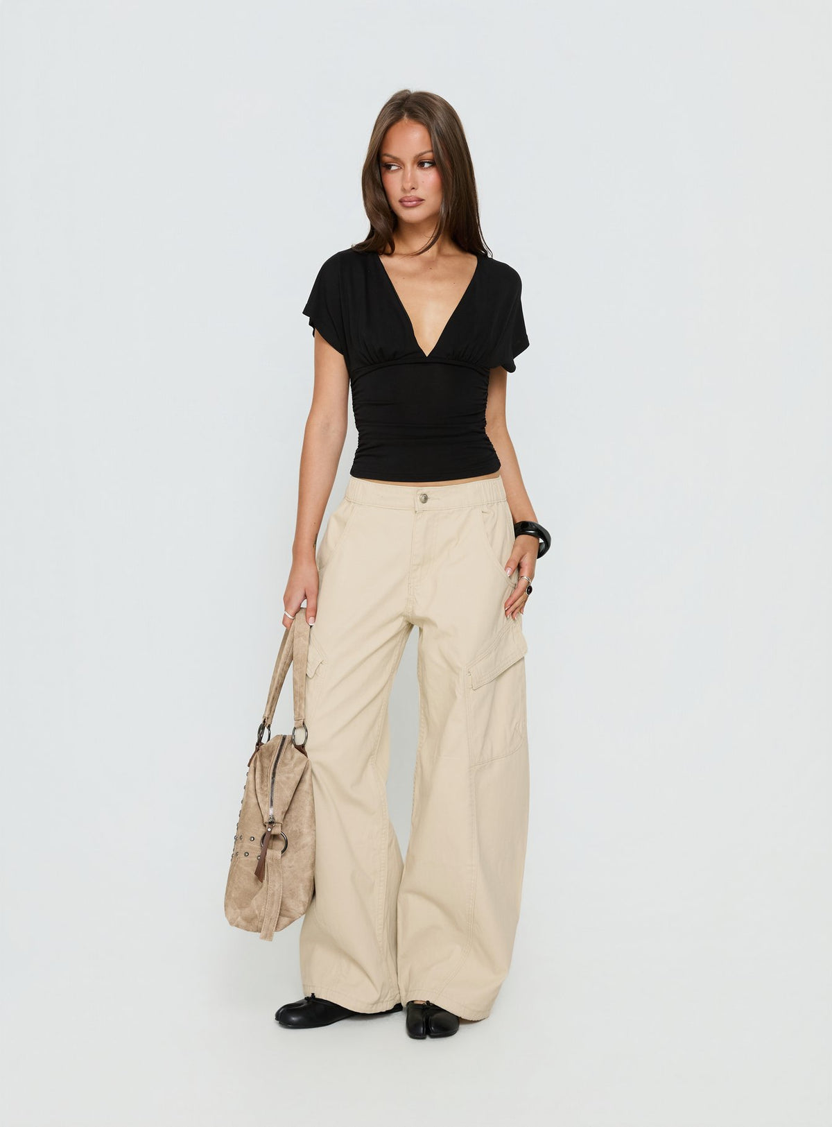 front view of model wearing Princess Polly Selective Memory Low Rise Wide Leg Cargo Pants Cream Low Rise Pants Pants 