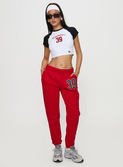 front view of model wearing Princess Polly BU Sweatpants Red High Rise Pants Pants 