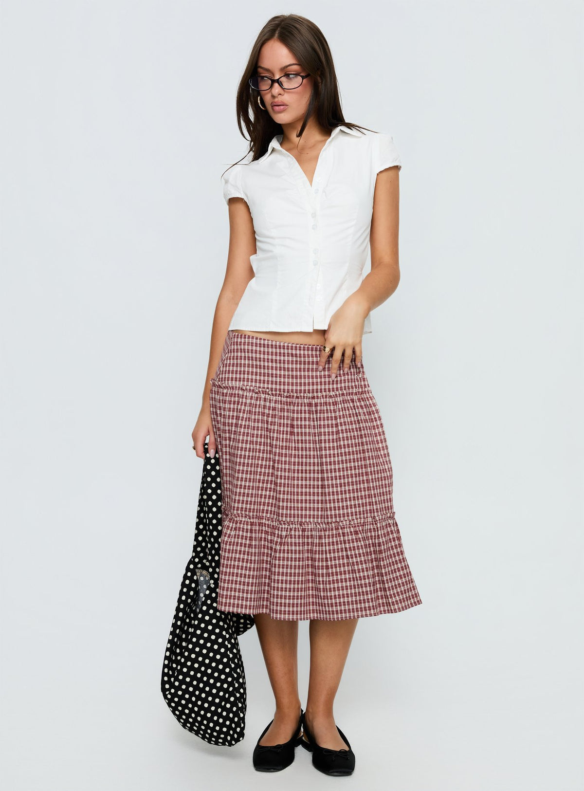   front view of model wearing Princess Polly Cascades Low Rise Midi Skirt Red Check Midi Skirts Skirts 