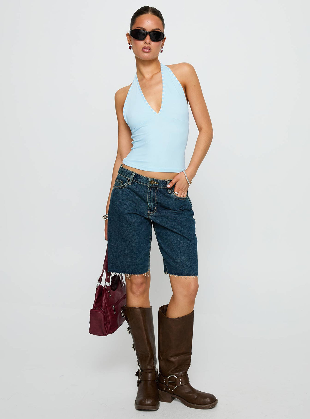 front view of model wearing Princess Polly Mirabelle Top Blue Sleeveless Plunger 