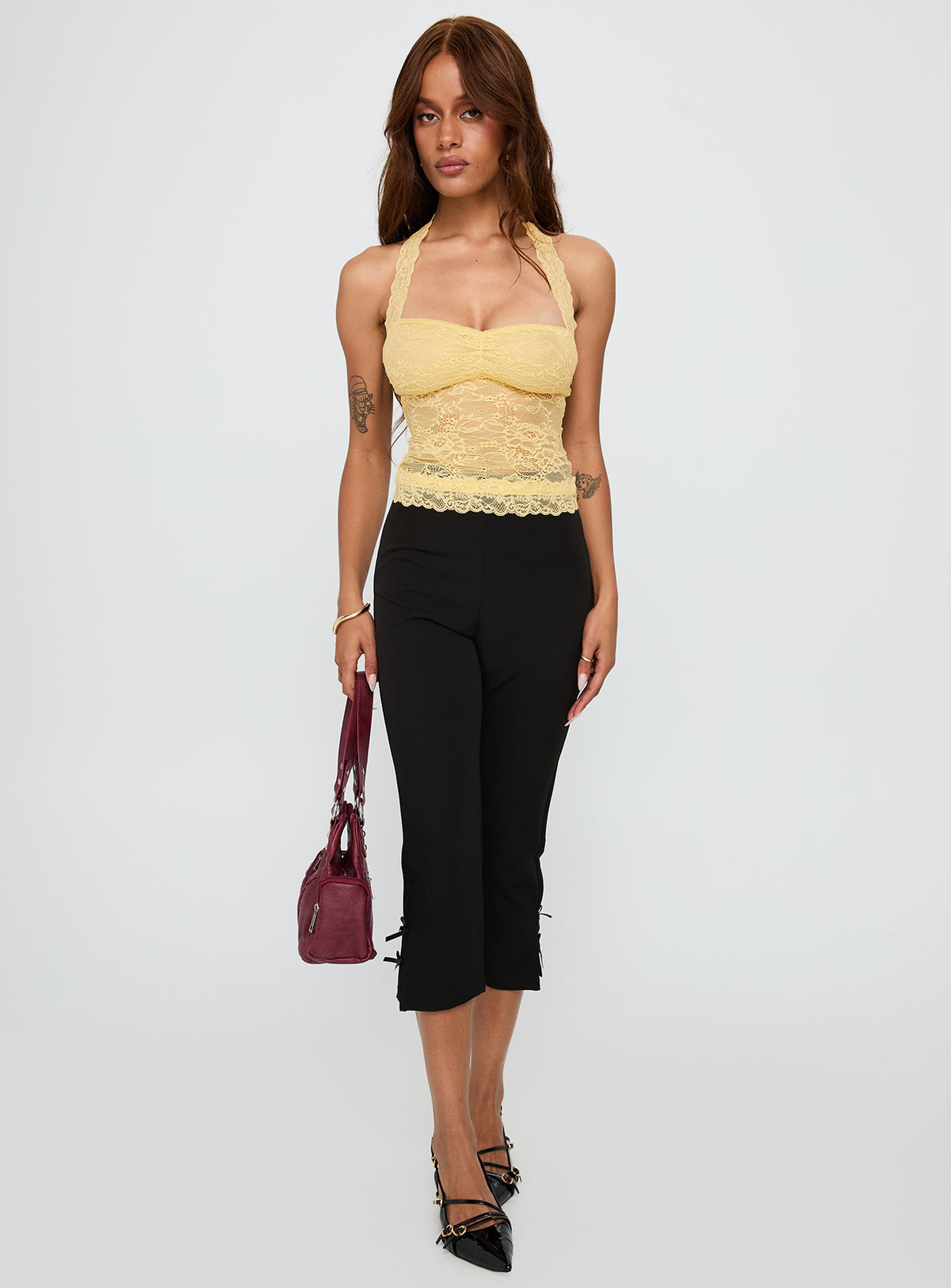 front view of model wearing Princess Polly Fantasize Lace Halter Top Yellow Sleeveless Sweetheart 