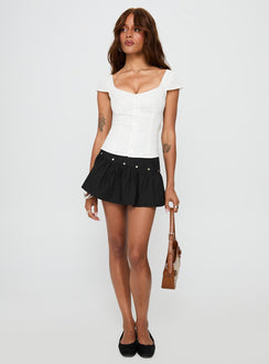   side view of model wearing Princess Polly Curtain Call Mini Skirt Black Mini Skirts Skirts 