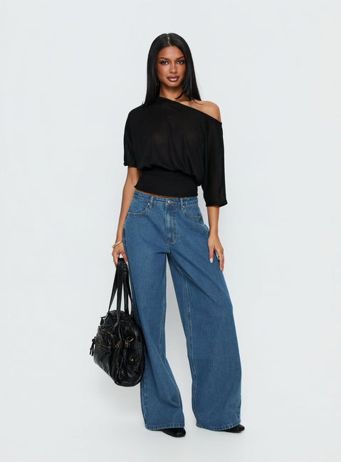 front view of model wearing Princess Polly Naylor Mid Rise Wide Leg Jeans Mid Blue Wash Mid Rise Jeans Jeans 