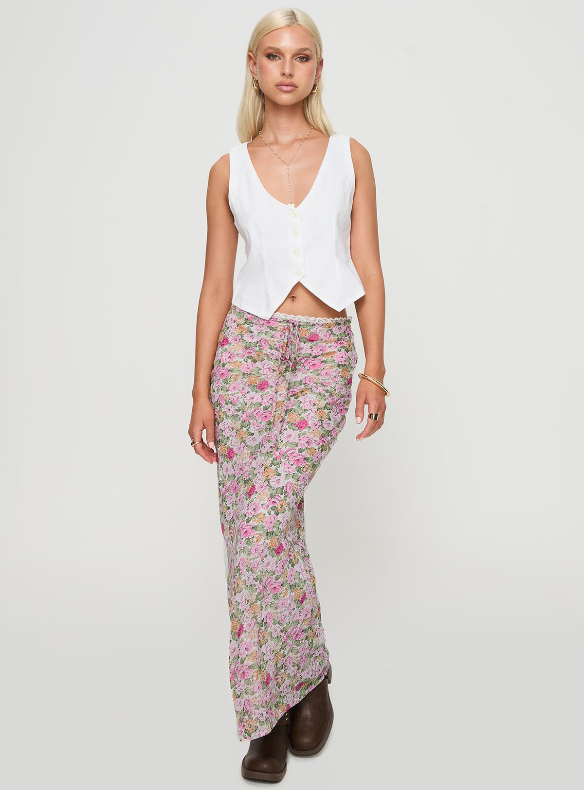   side view of model wearing Princess Polly Emily Maxi Skirt Pink Floral Maxi Skirts Skirts 