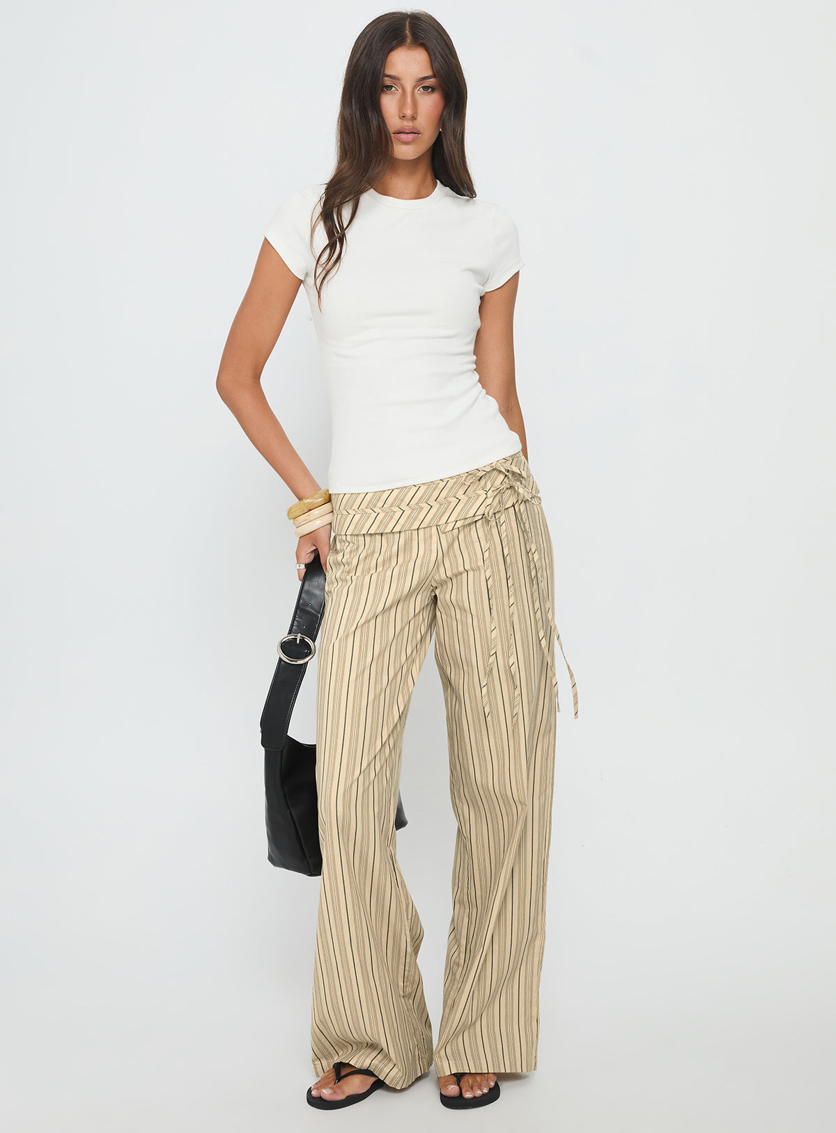front view of model wearing Princess Polly Seneca Wrap Pant Beige Stripe Mid Rise Pants 