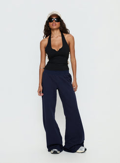 front view of model wearing Princess Polly Summits Flared Track Pants Navy Mid Rise Pants Pants 