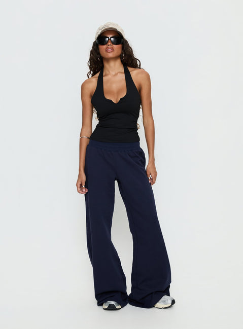 front view of model wearing Princess Polly Summits Flared Track Pants Navy Mid Rise Pants Pants 