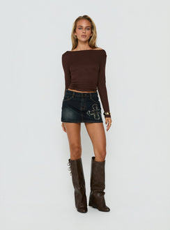 Showcasing the Barracuda Applique Denim Mini Skirt in Grunge Wash womens-skirts with fitted silhouette front view of model wearing Princess Polly