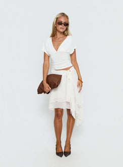 Crafted in ivory, the Ophella Tie Waist Chiffon Midi Skirt Cream womens-skirts with asymmetry and layered details product Princess Polly