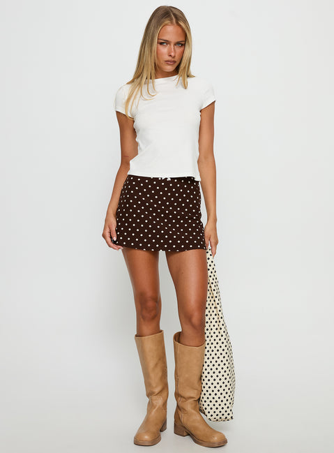 back view of model wearing Princess Polly Tejano Mini Skirt Brown Polka Dot Mini Skirts Skirts 