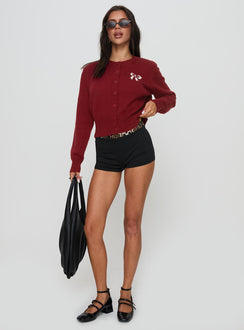 front view of model wearing Princess Polly With A Bow Cardigan Red Jumpers 