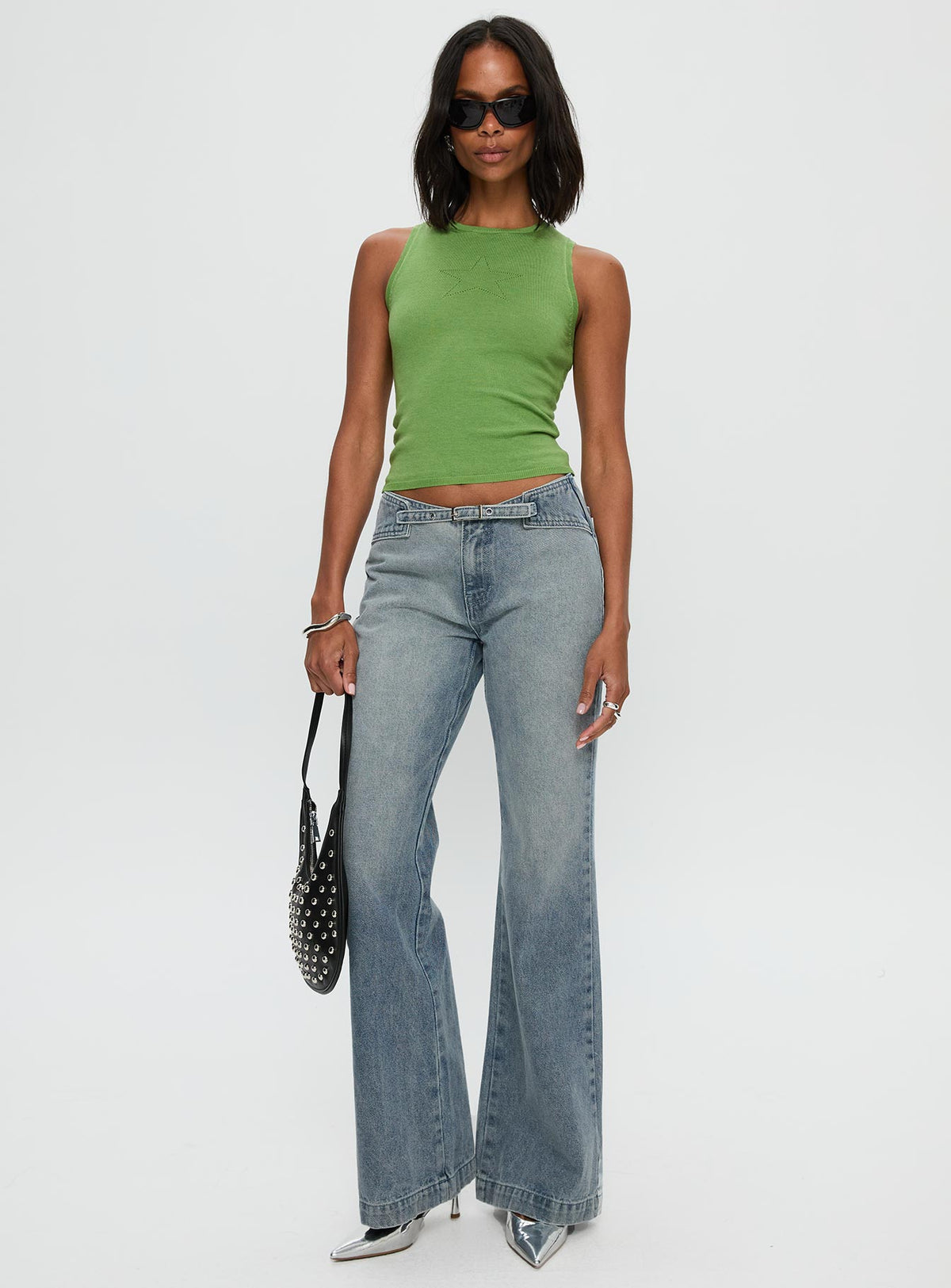 front view of model wearing Princess Polly Slow Ride Mid Rise Bootleg Belted Jeans Light Blue Mid Rise Jeans Jeans 
