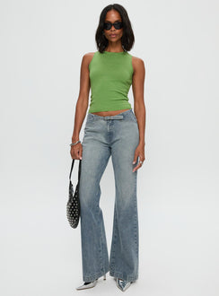 front view of model wearing Princess Polly Slow Ride Mid Rise Bootleg Belted Jeans Light Blue Mid Rise Jeans Jeans 