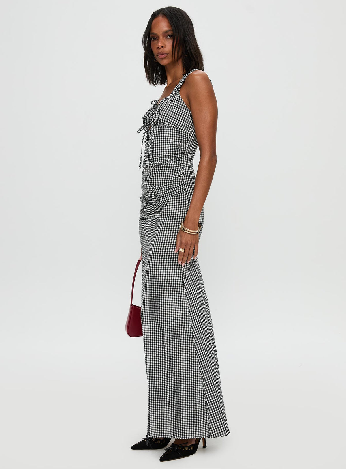 side view of model wearing Princess Polly Roundtrip Maxi Dress Black / White Scoop Neck 