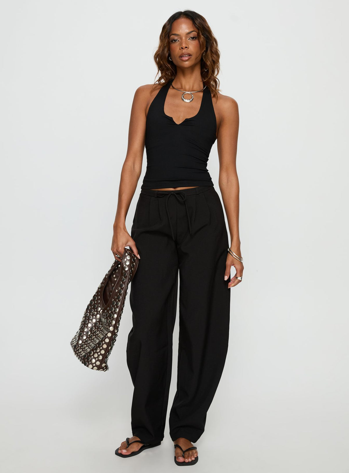 front view of model wearing Princess Polly Triffid Barrel Leg Pants Black High Rise Pants Pants 