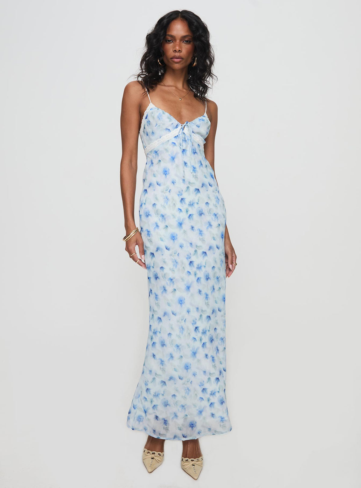 side view of model wearing Princess Polly Emily Maxi Dress Blue Floral V-Neck 