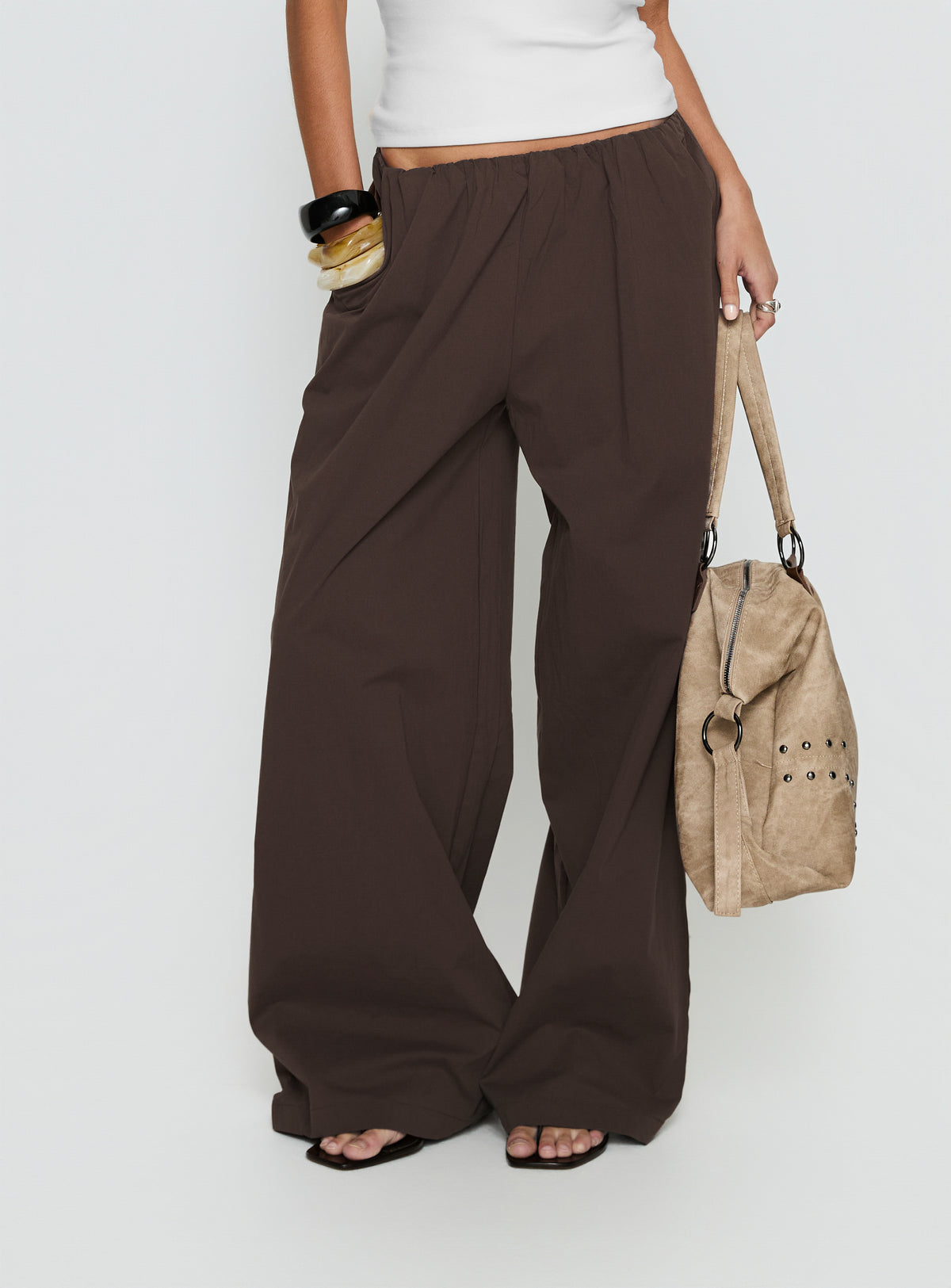 Crafted from Lunea Concealed Waistband Pants Brown Petite womens-regular-pants with high-rise side view of model wearing Princess Polly