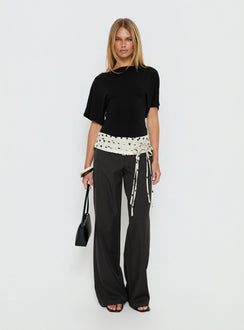 back view of model wearing Princess Polly Seneca Wrap Pants Charcoal Polka Dot Mid Rise Pants Pants 