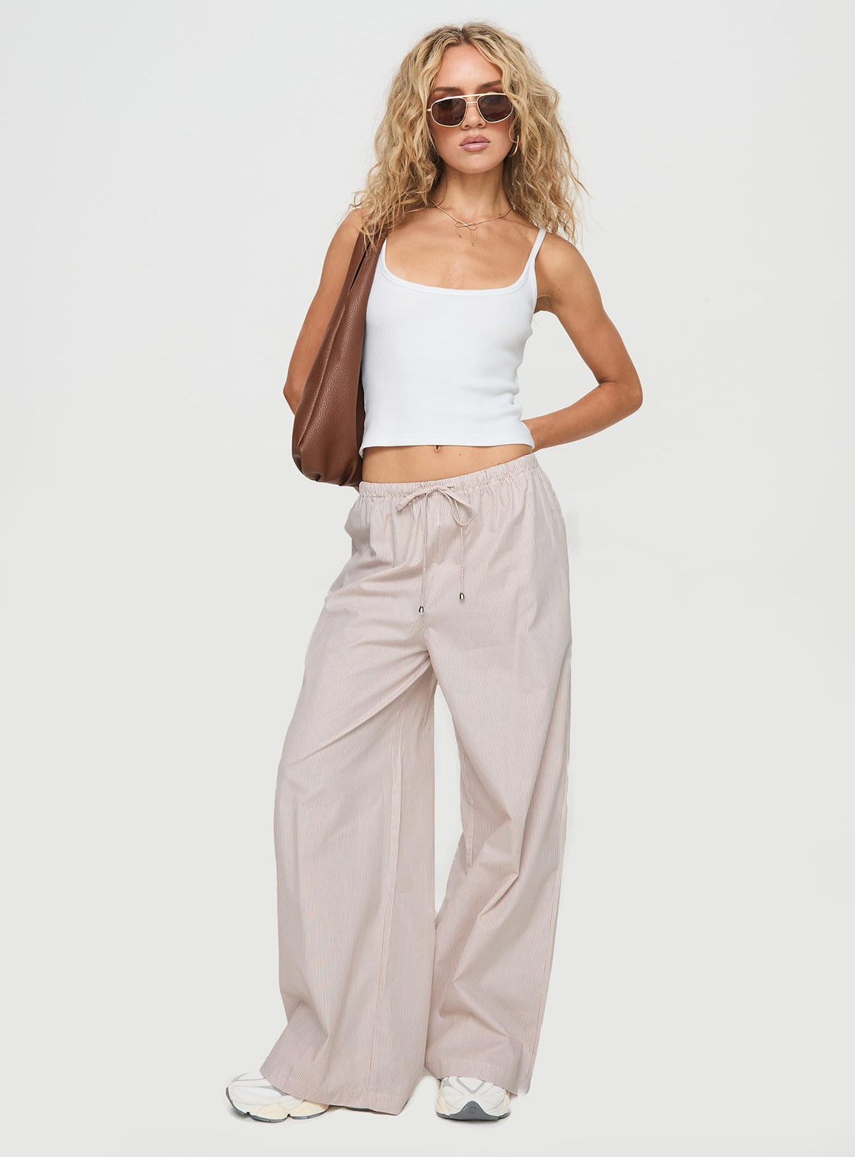 front view of model wearing Princess Polly Ogilvie Pants Beige Stripe Mid Rise Pants Pants 