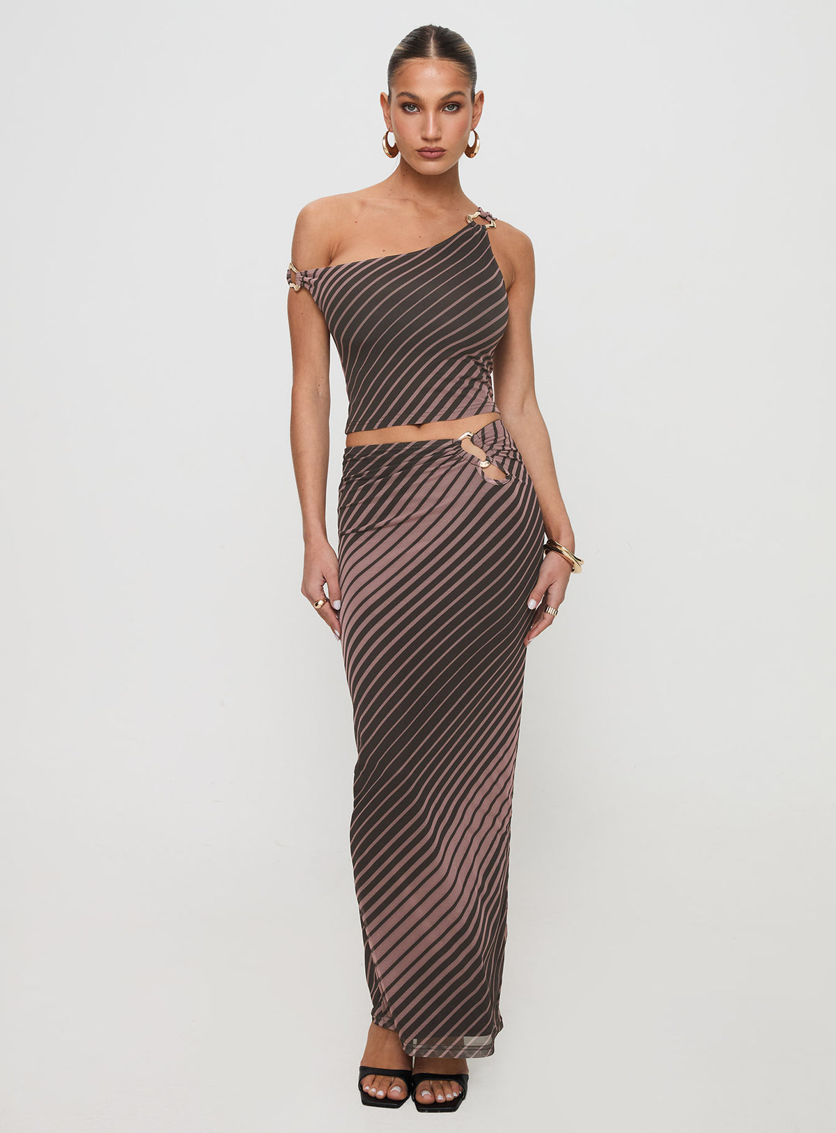  side view of model wearing Princess Polly Whiley Maxi Skirt Multi Stripe Maxi Skirts Skirts 