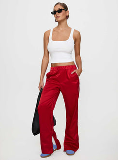 front view of model wearing Princess Polly Travalta Satin Track Pant Red Low Rise Pants Pants 