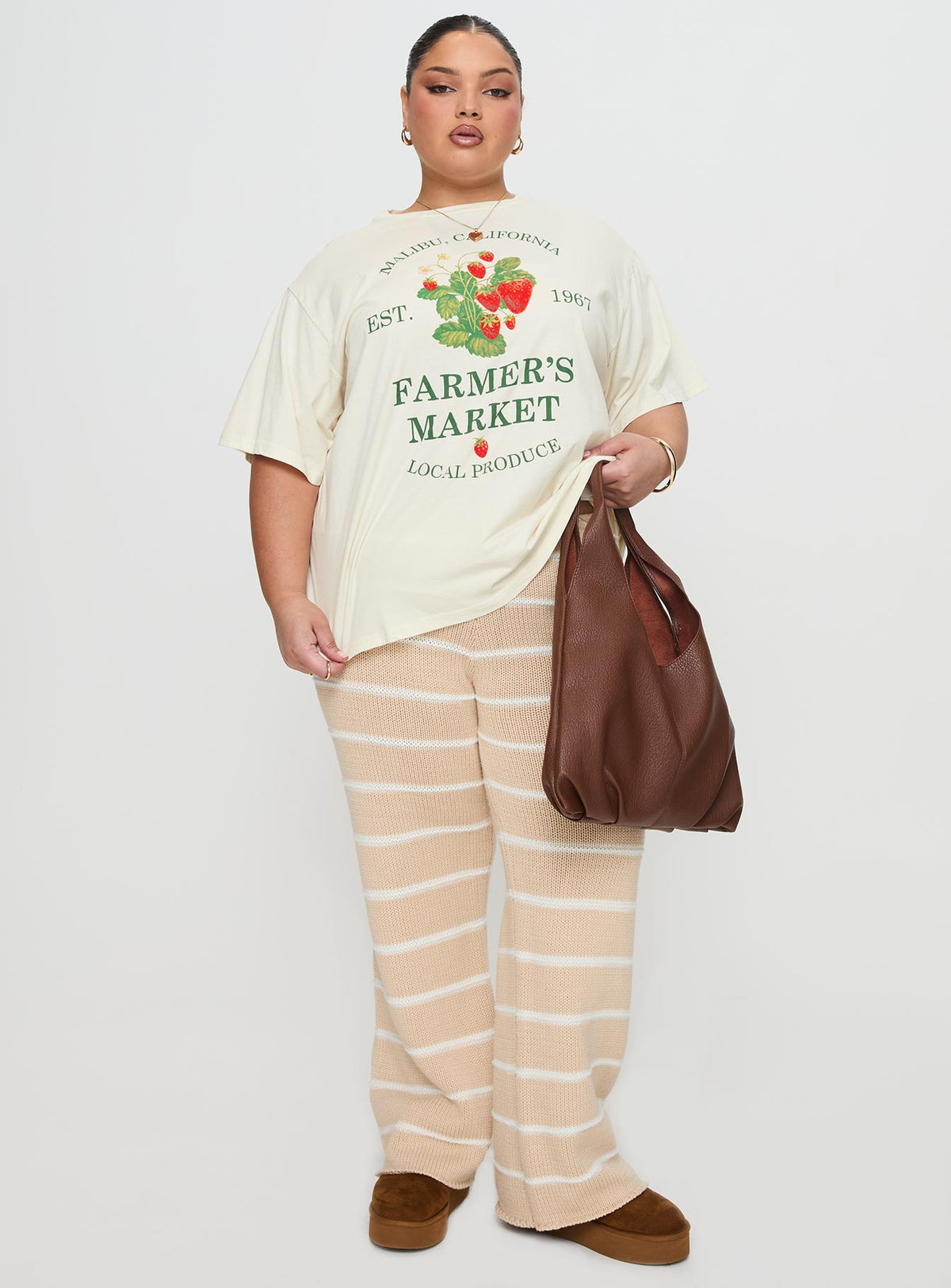 side view of model wearing Princess Polly Local Produce Tee Cream Curve Half Sleeves Crew Neck 