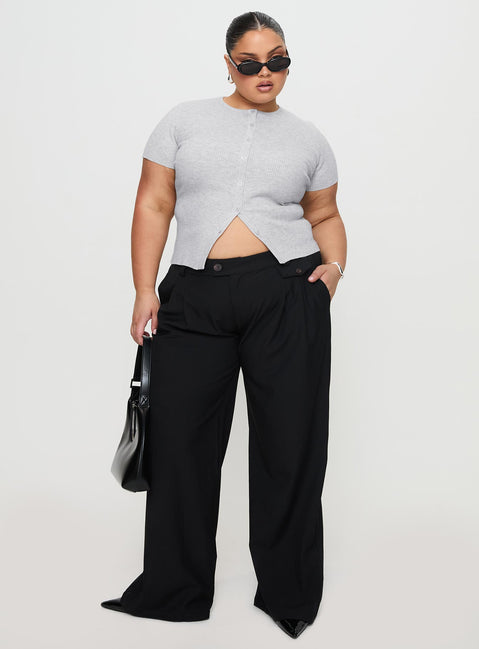 front view of model wearing Princess Polly Sallon Low Rise Pants Black Low Rise Pants Pants 