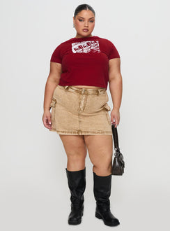   side view of model wearing Princess Polly Velveta Low Rise Denim Skirt Camel Curve Mini Skirts Skirts 