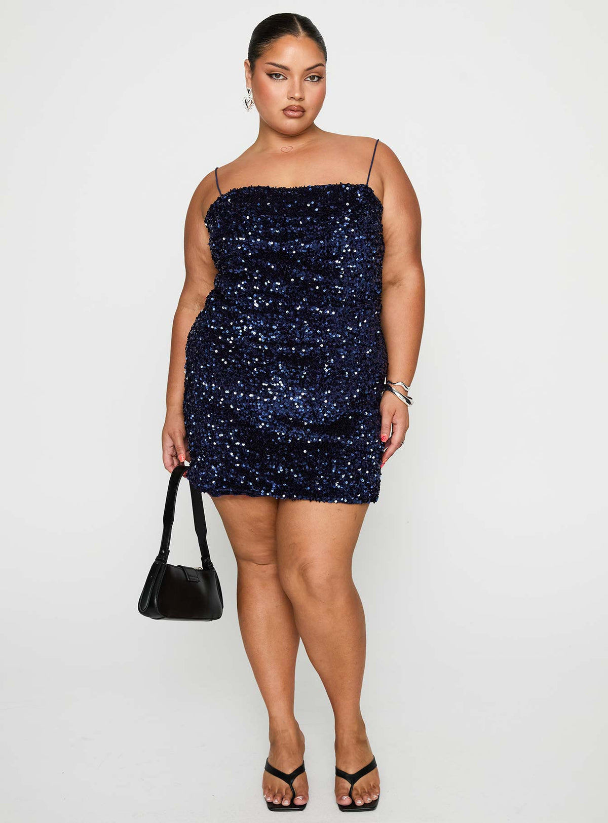 front view of model wearing Princess Polly Layney Sequin Mini Dress Navy Curve Square Neck 