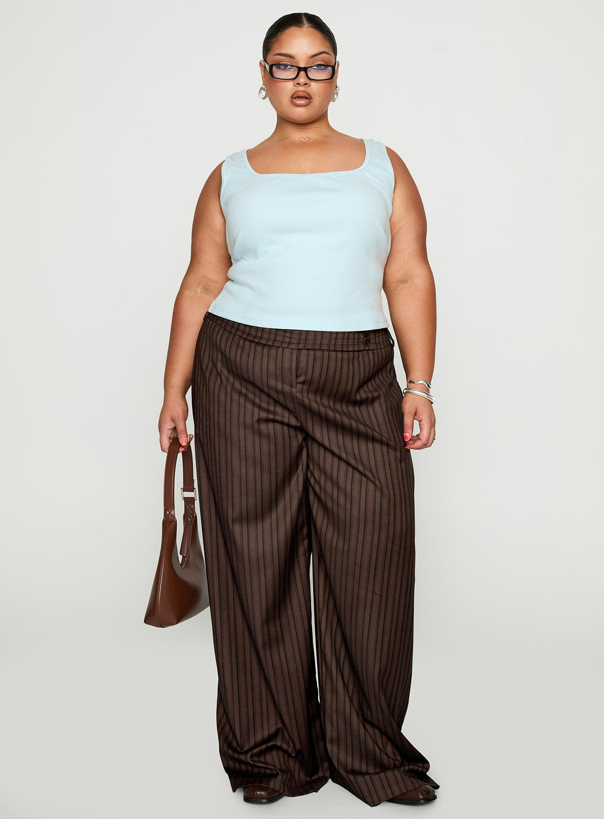front view of model wearing Princess Polly Cedars Low Rise Pant Brown Stripe Curve Low Rise Pants Pants 