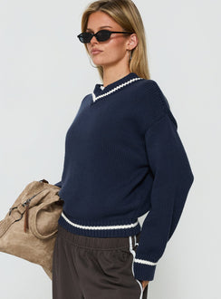 Designed with the Myrandah V Neck Long Sleeve Knit Jumper Navy womens jumper with short length side view of model wearing Princess Polly