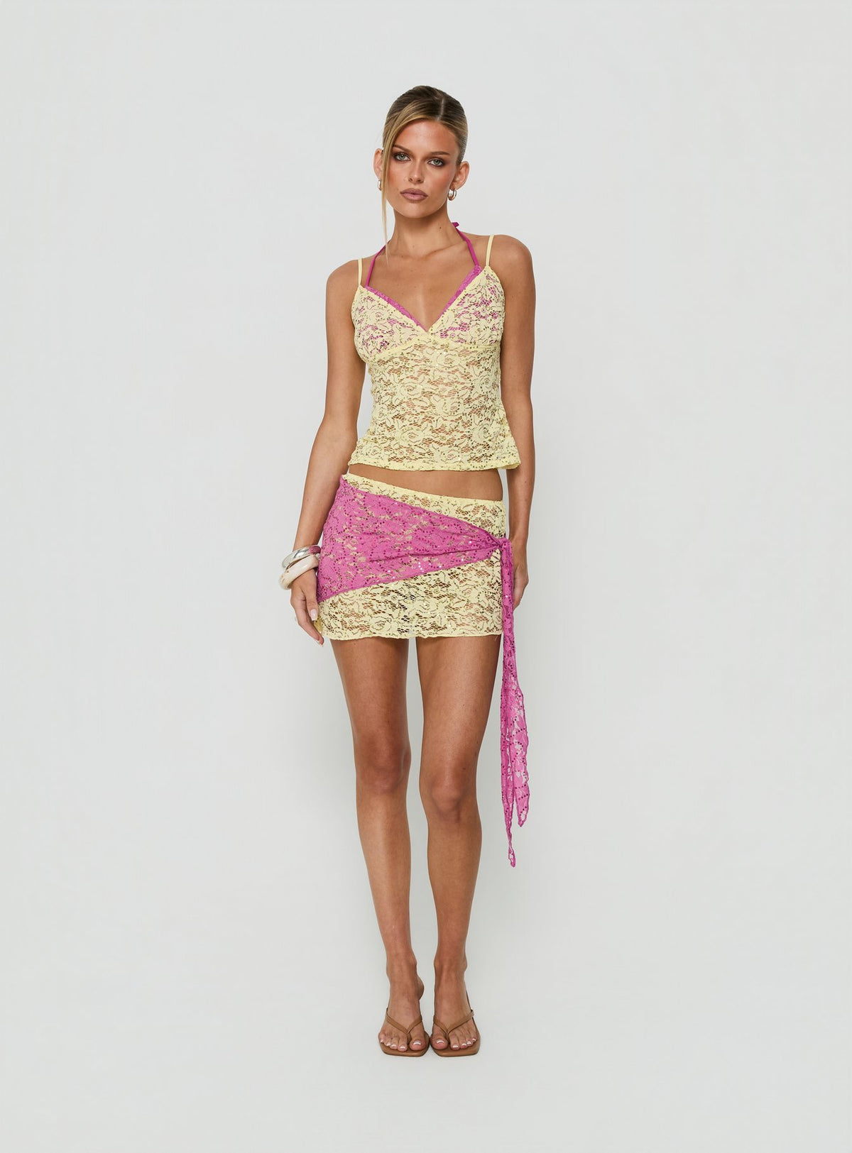 Featuring the Sirna Lace Wrap Contrast Mini Skirt Lime / Pink womens-skirts mini product Princess Polly