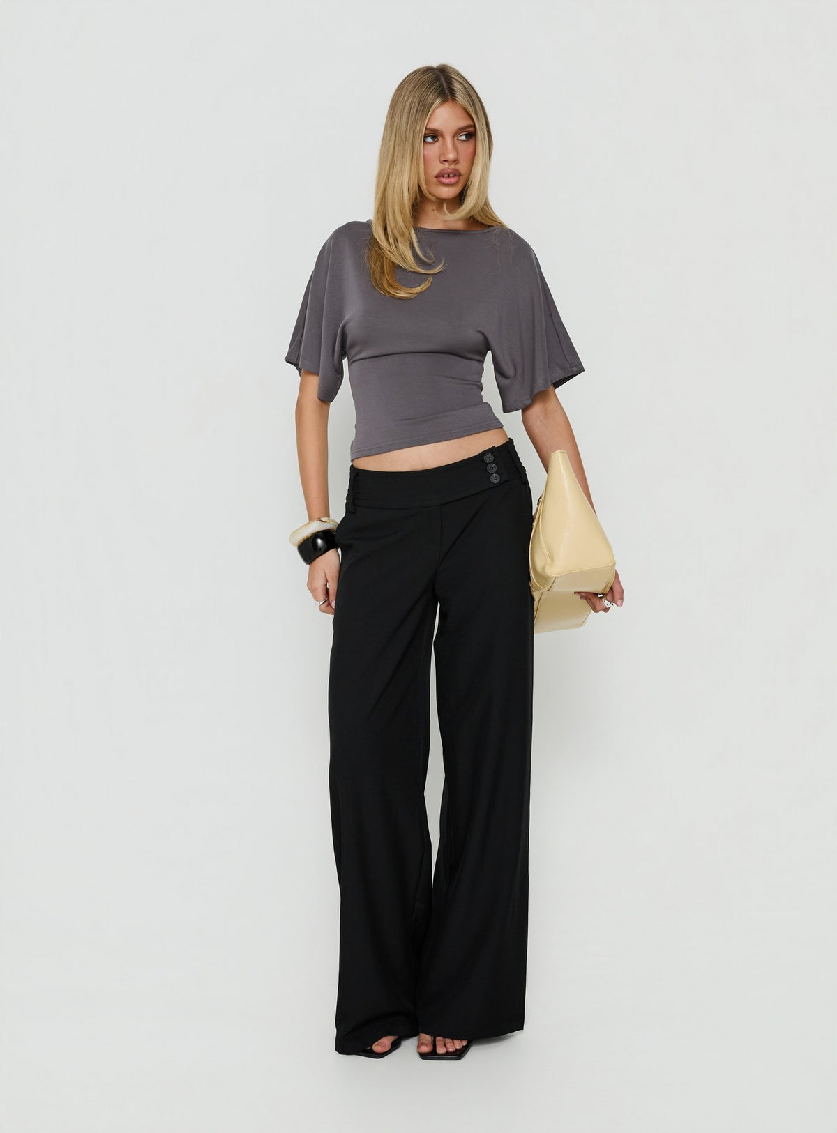Explore the Cedars Low Rise Pant Black womens-regular-pants with low-rise front view of model wearing