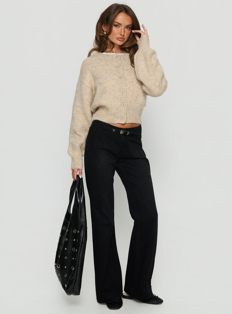 side view of model wearing Princess Polly Slow Ride Mid Rise Bootleg Belted Jeans Washed Black Mid Rise Jeans 