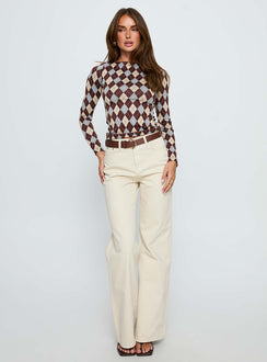 front view of model wearing Princess Polly Maple Mid Rise Flare Jeans Ecru High Rise Jeans Jeans 