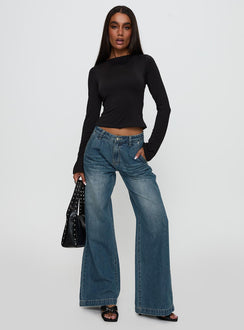front view of model wearing Princess Polly Laguardia Mid Rise Wide Leg Jeans Dark Blue Wash Mid Rise Jeans Jeans 