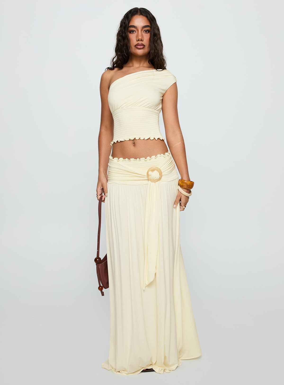   front view of model wearing Princess Polly Full Orbit Shirred Maxi Skirt Cream Maxi Skirts Skirts 